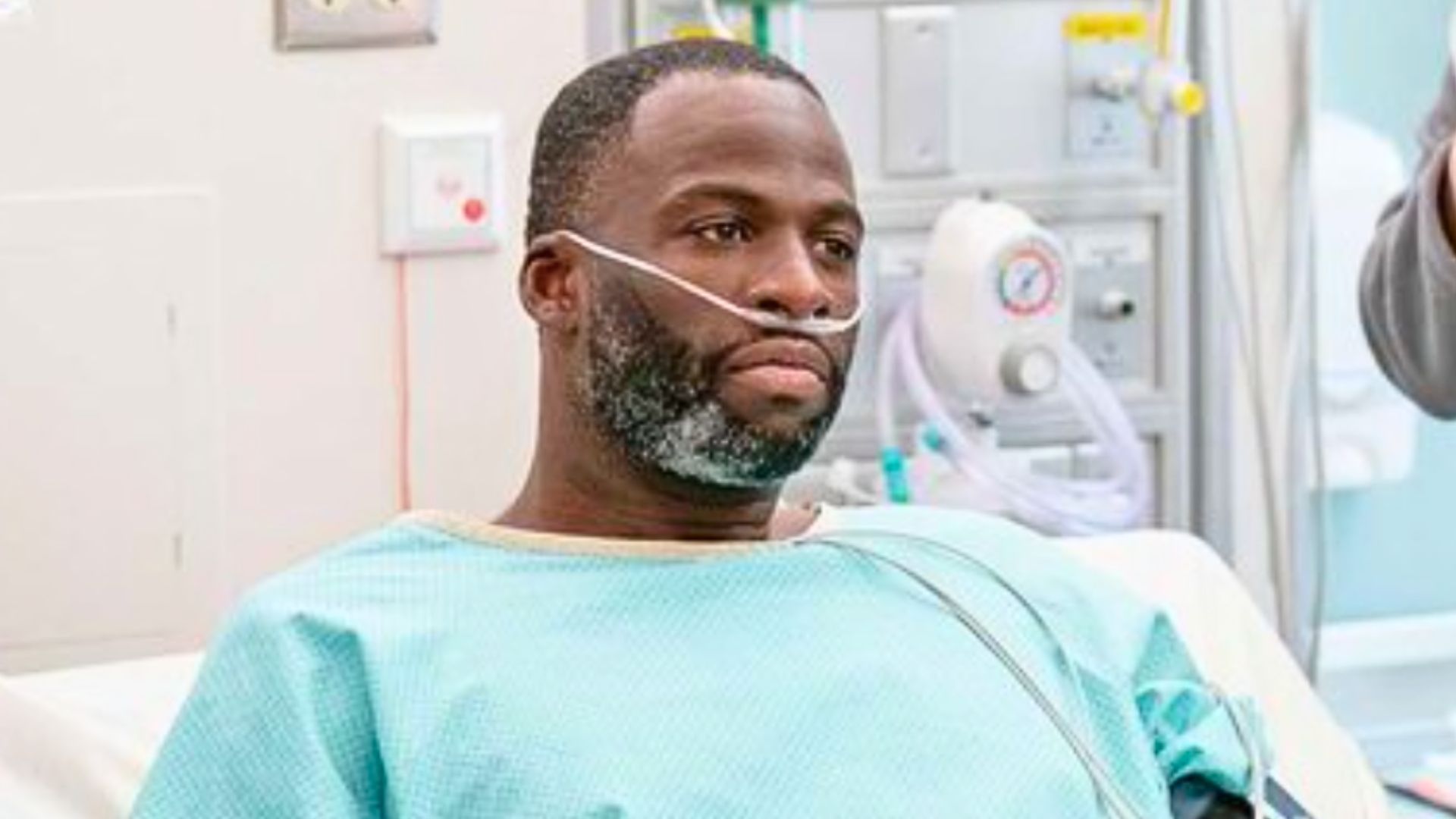 NBA player Draymond Green in a hospital bed as a patient in St. Denis Medical Season 2 (Image via NBC )