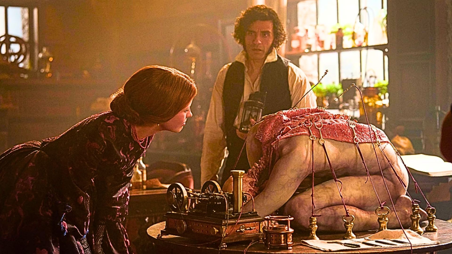 Oscar Isaac and Mia Goth in Frankenstein (Image via Netflix)