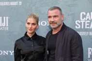 Taylor Neisen and Liev Schreiber at the premiere of "Caught Stealing" in New York (Image via Getty)