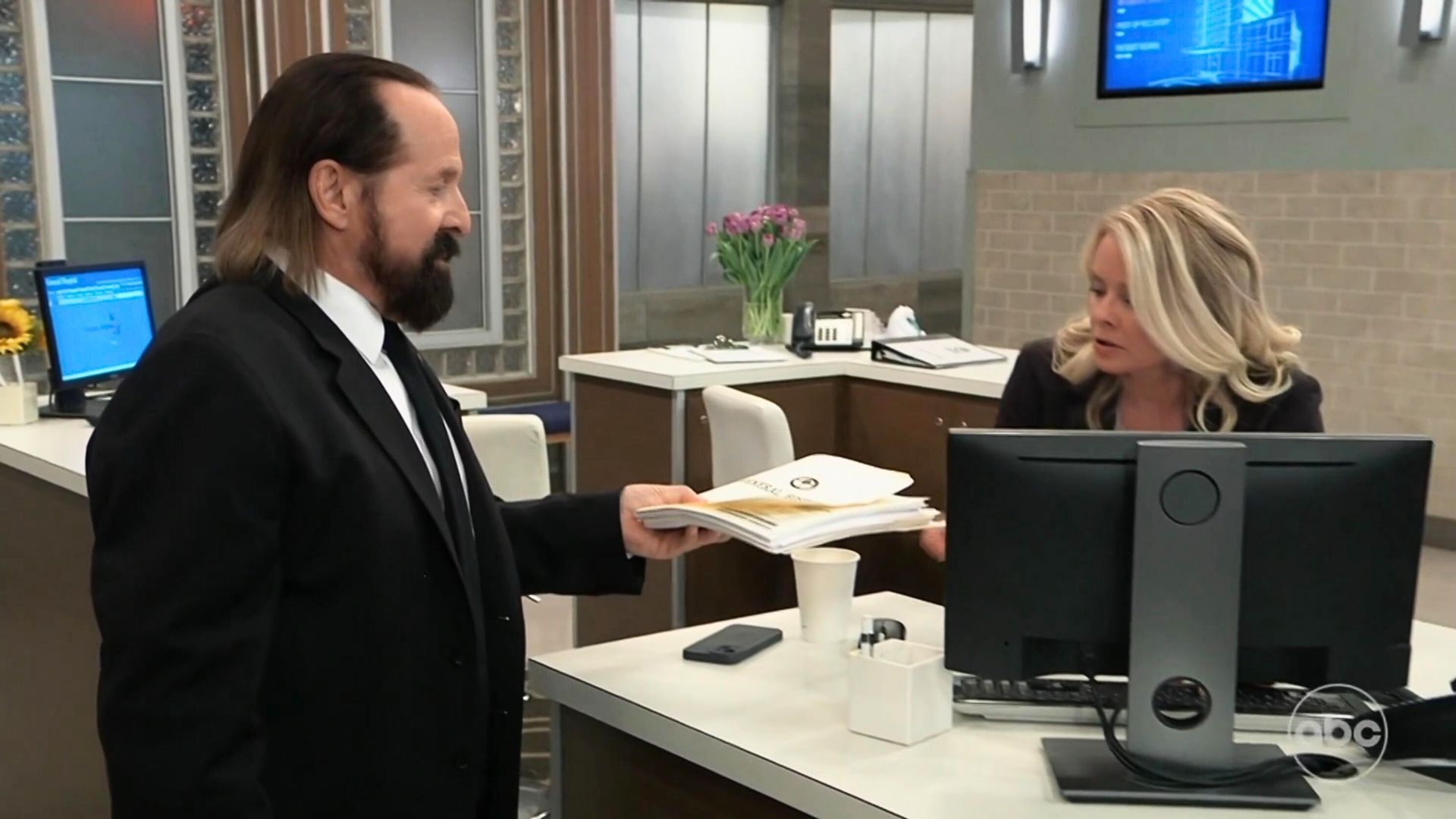 General Hospital: The Replacer hands a folder to Kristina | Image: ABC