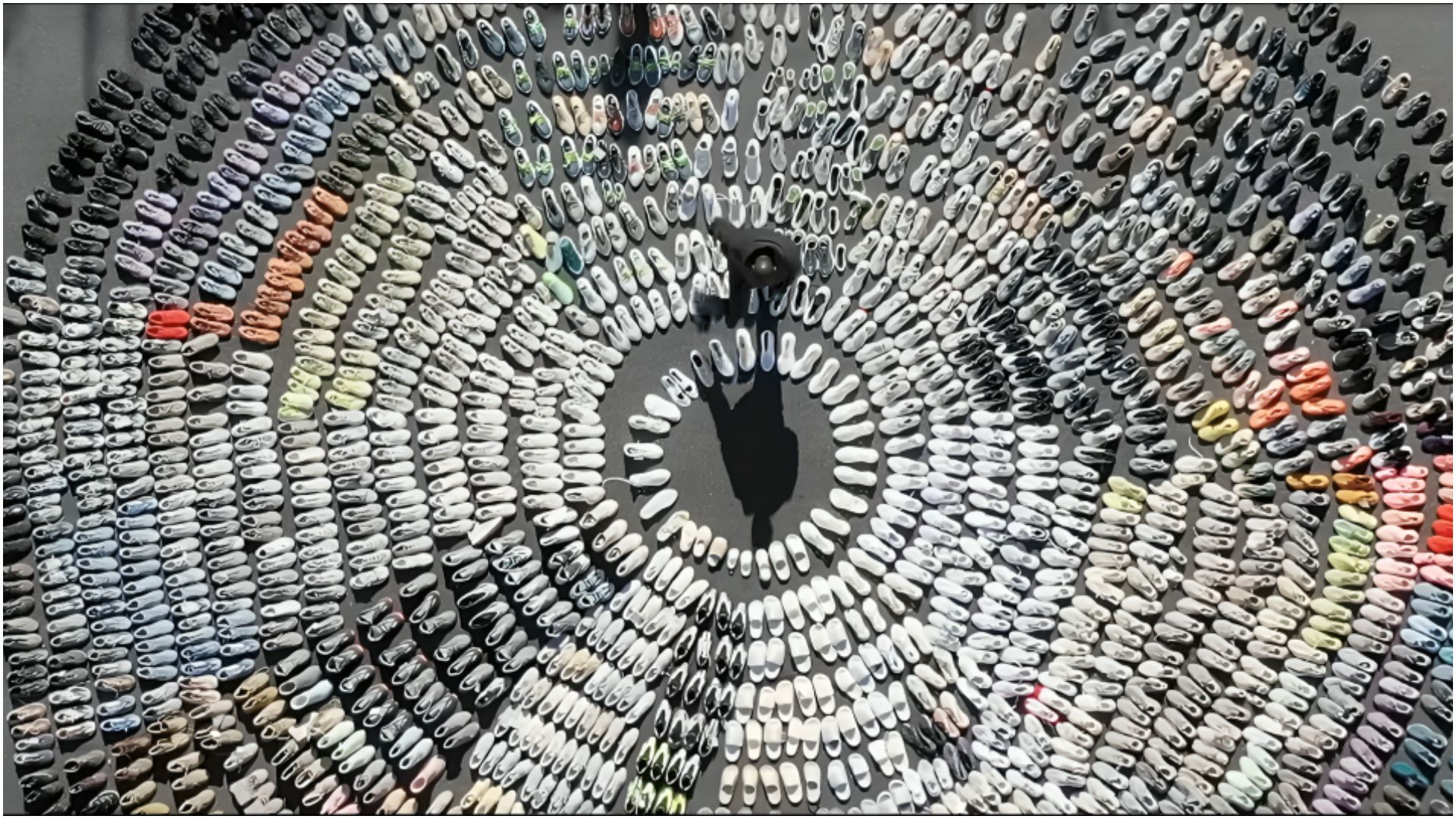 A still from In Whose Name? | Image via In Whose Name Official YouTube