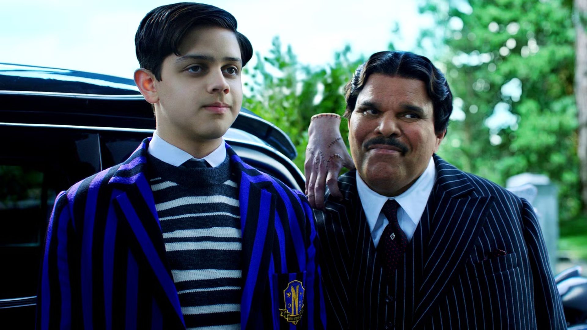 Pugsley Addams with his father (Image via Netflix)