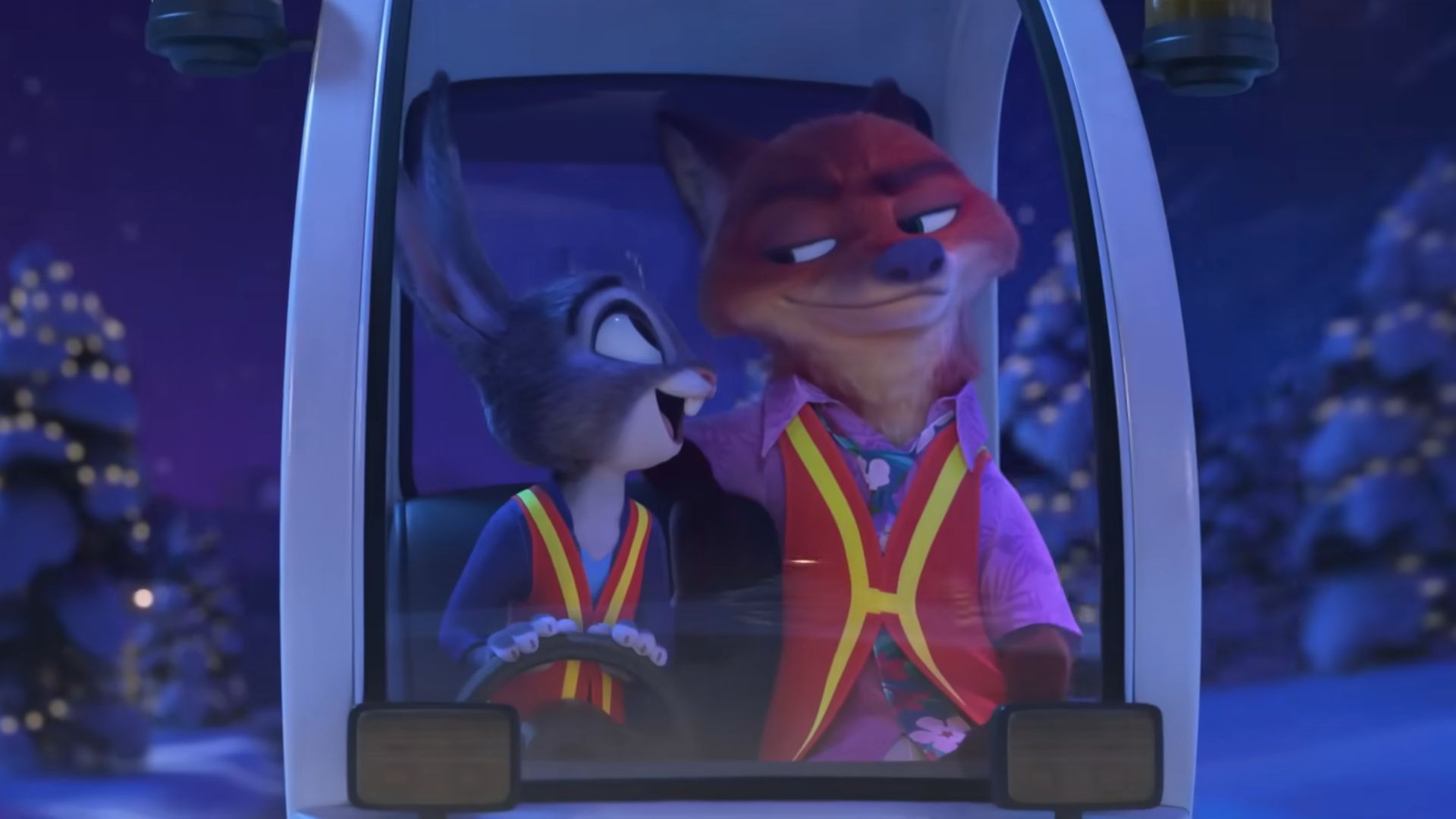 Judy watches Nick with happiness as she drives