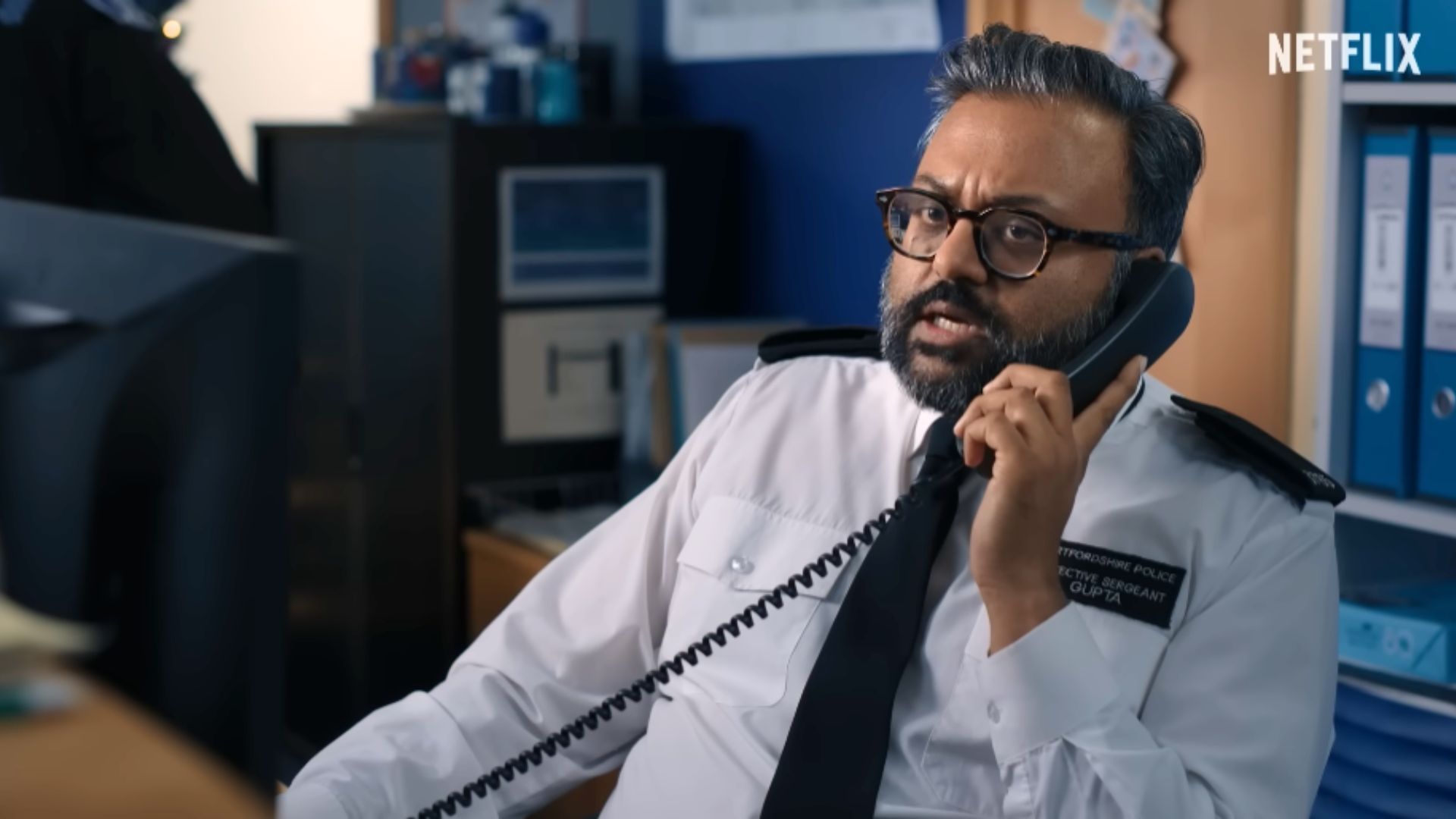 Police officials in Man vs. Baby | Image via Netflix