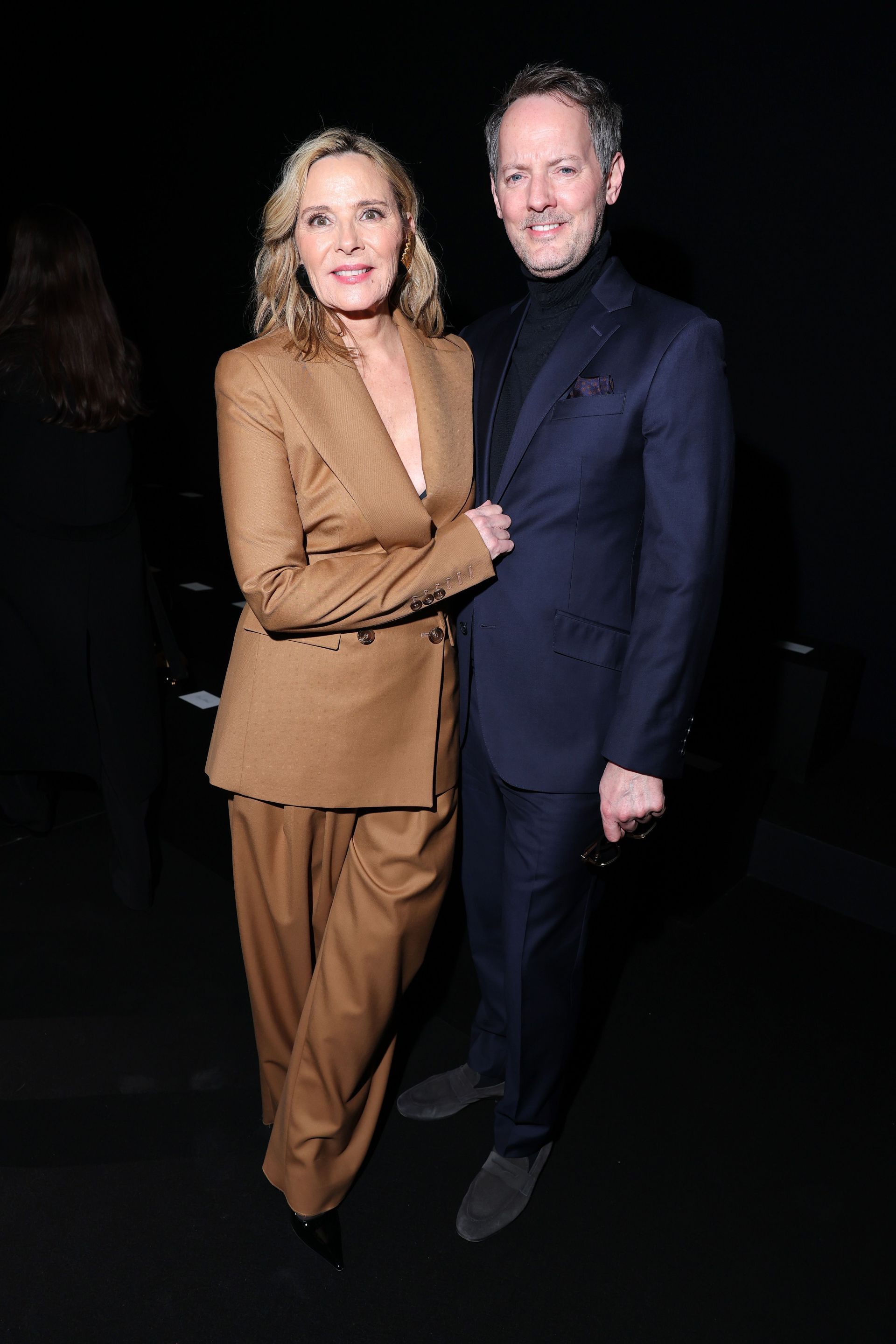 Kim Cattrall and Russell Thomas at Paris Fashion Week earlier this year (Image via Getty)