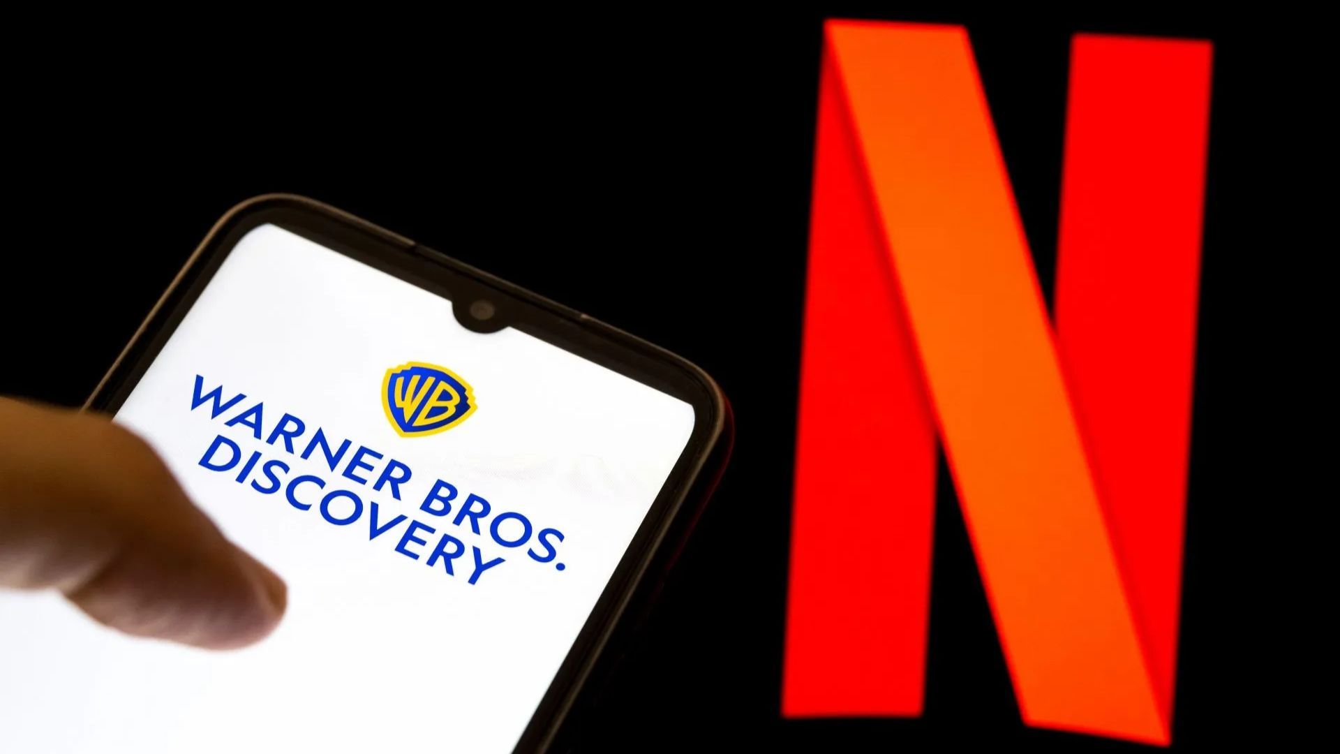 Netflix x Warner Bros. (Image via Getty)