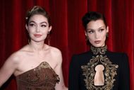 Gigi Hadid and Bella Hadid at Moschino - Backstage - Milan Fashion Week Fall/Winter 2022/2023 - Source: Getty