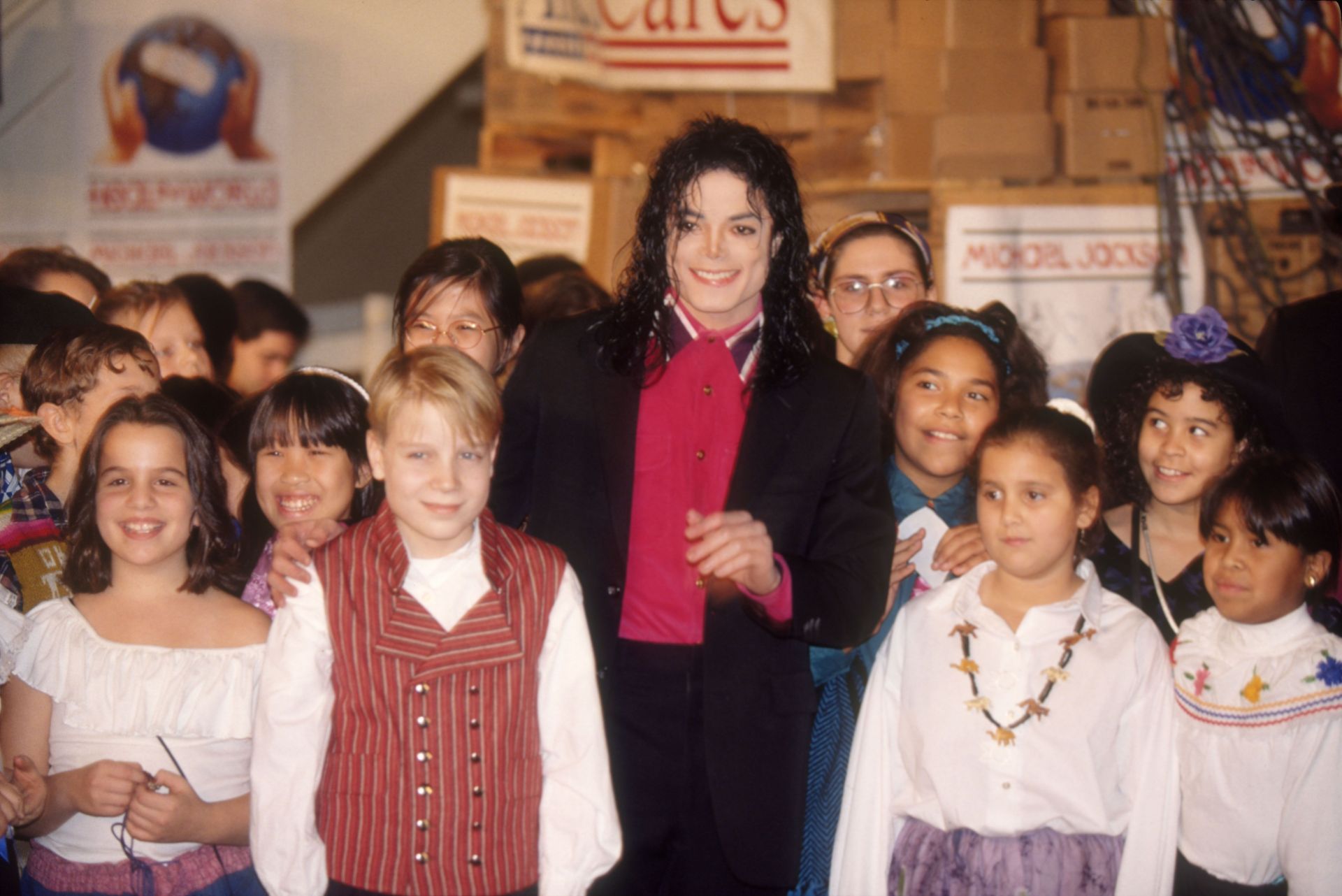 Michael Jackson with kids - Source: Getty
