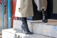 Anna Delvey's ankle monitor is seen under her boot on July 13, 2023 in New York City. Delvey was released from prison on good behavior in February of 2021 after serving nearly four years - Source: Getty