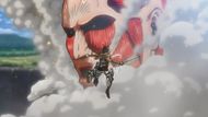 Eren face-to-face with the Colossal Titan - Source: Wit Studio