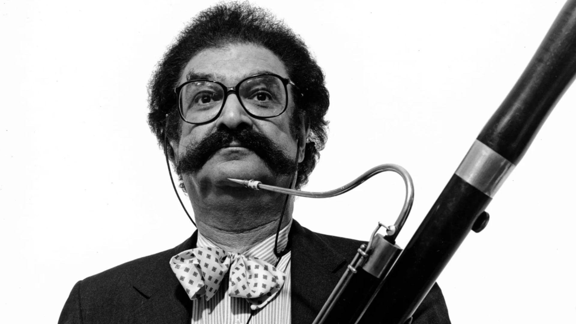 A look at the numbers as the legendary film critic passes away at 100