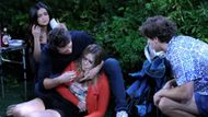 Holly passed out in Tate's arms by the campfire | Image: JPI