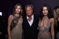 (L-R) Gigi Hadid, Mohamed Hadid and Bella Hadid attend the Victoria's Secret After Party at the Grand Palais on November 30, 2016 in Paris, France - Source: Getty