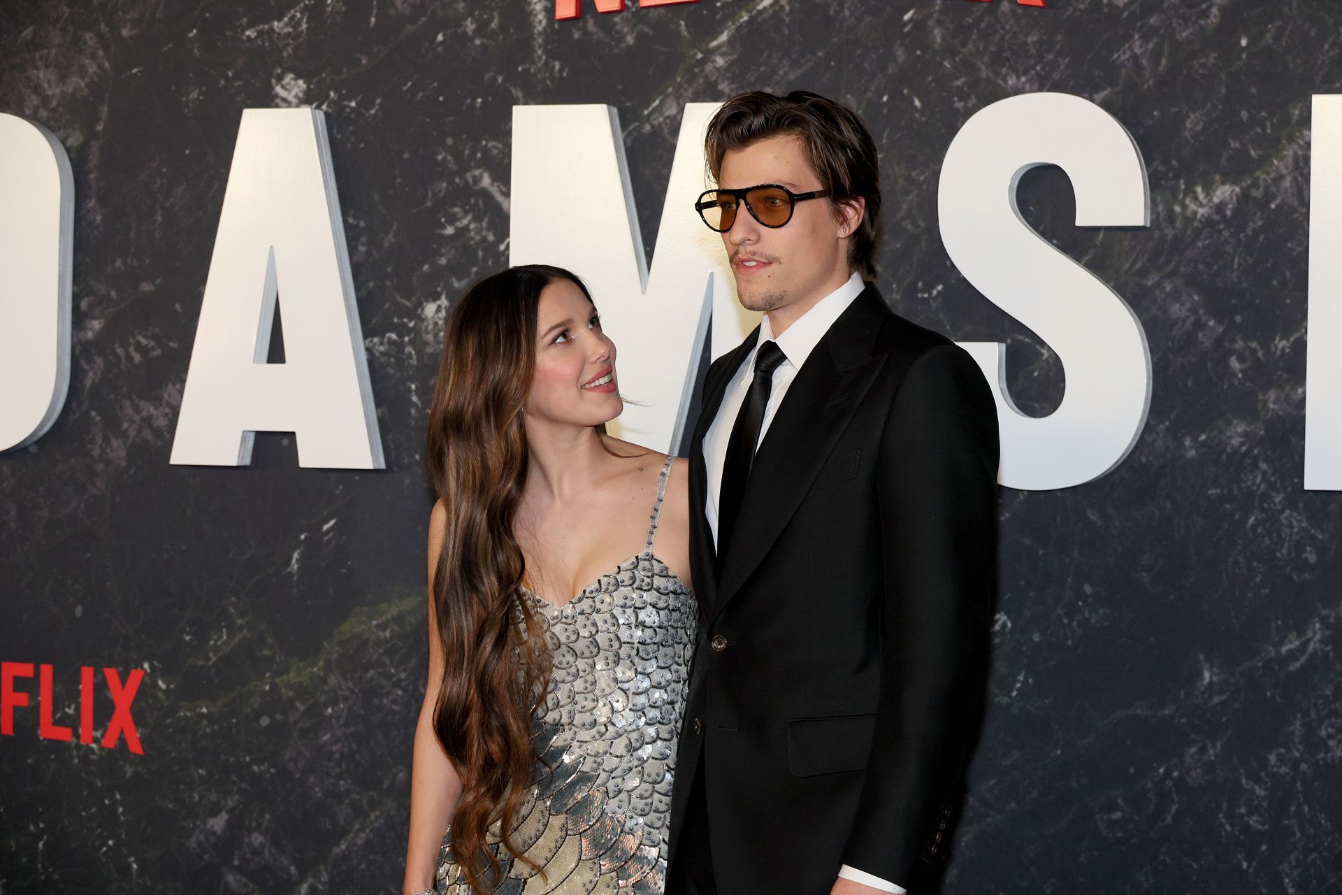 Millie Bobby Brown cites “women empowerment” as she speaks in husband Jake Bongiovi's defense after he was accused of not helping her carry bags