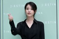 IU aka Lee Ji-Eun poses for J.ESTINA - Photocall - Source: Getty