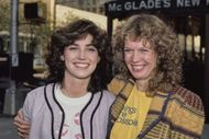 Kim Delaney, wearing a baseball shirt over a white t-shirt with lip motifs, with her 'All My Children' co-star, American actress Dorothy Lyman, who wears a cardigan over a yellow t-shirt, on the Upper West Side of Manhattan, New York City, New York, circa 1985 - Source: Getty