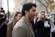 Justin Baldoni and Emily Baldoni arrive at New York Federal Courthouse for his trial against Blake Lively on February 12, 2026 in New York City - Source: Getty