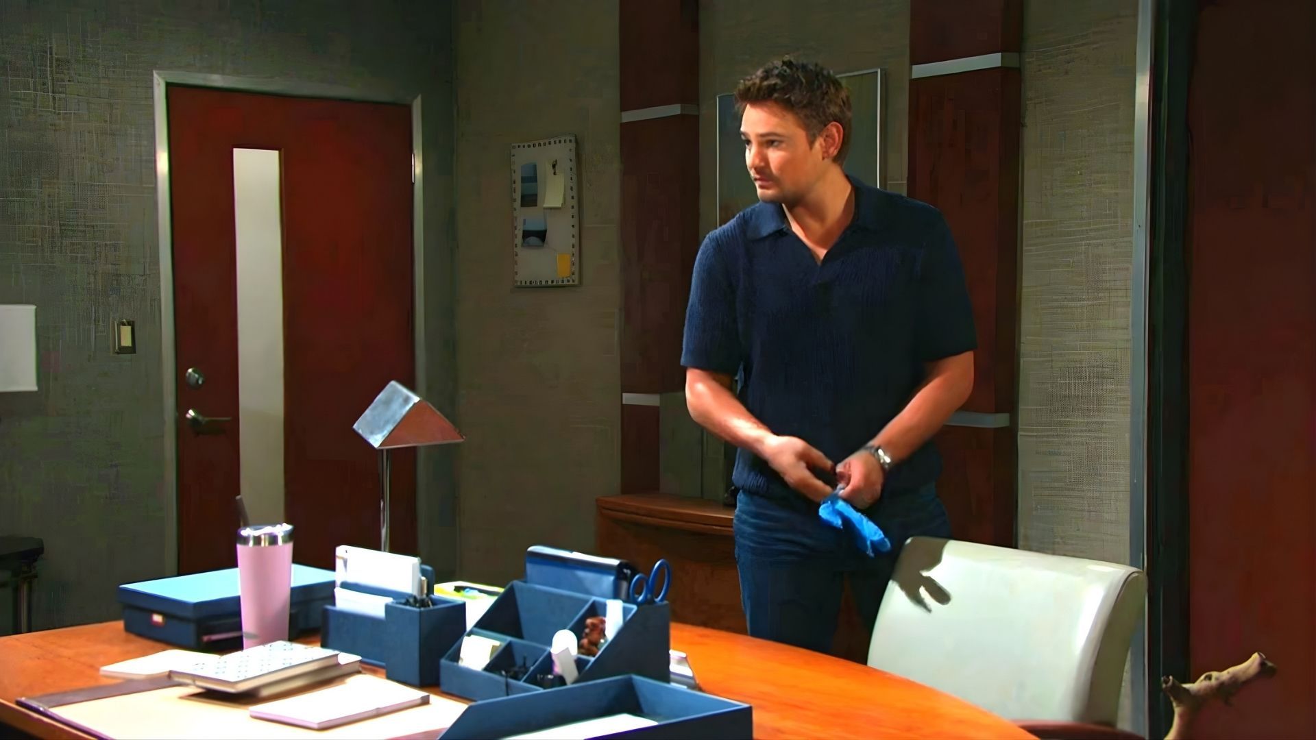 Johnny seemed to do something nefarious in Sarah's office | Image: Peacock