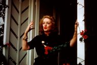 Bette Davis poses on her front porch at her house circa 1967 in Los Angeles, California - Source: Getty