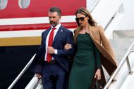 Donald Trump Jr. and his wife Bettina Anderson (Image via Getty)