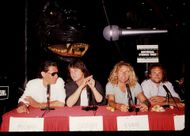 (L-R) Alex Van Halen, Eddie Van Halen, Sammy Hagar and Michael Anthony of Van Halen speak at a press conference in 1988 in Los Angeles, California. - Source: Getty