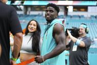 Tyreek Hill of the Miami Dolphins and Keeta Vaccaro look on prior to a preseason game between the Miami Dolphins and the Atlanta Falcons at Hard Rock Stadium on August 09, 2024 in Miami Gardens, Florida - Source: Getty