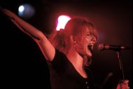 Sass Jordan is shown performing on stage during a “live" concert appearance on May 8, 1994 in New Britain, Connecticut - Source: Getty